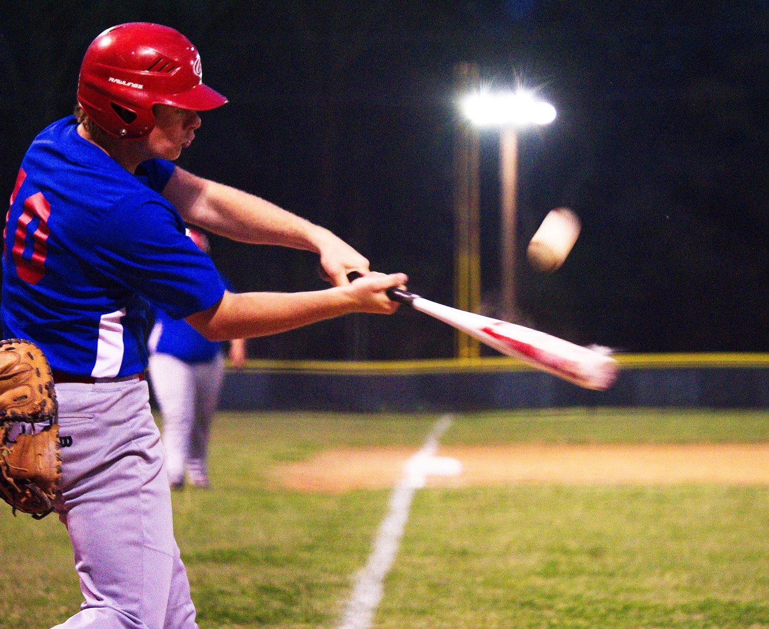 Blake Weissert makes contact against the North Hopkins pitcher.